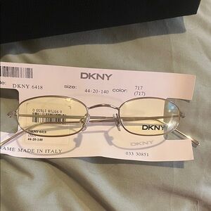 DKNY Silver Metal Oval Glasses with Pale Yellow Lenses